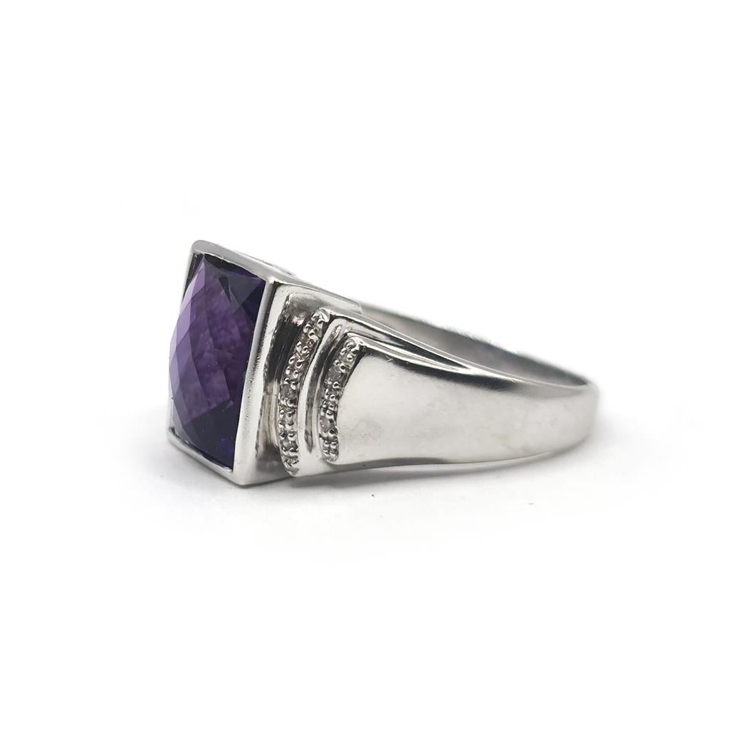 14ct white gold ring featuring a 4.25 carat amethyst centerpiece accented with small diamonds, elegant jewelry for special occasions.