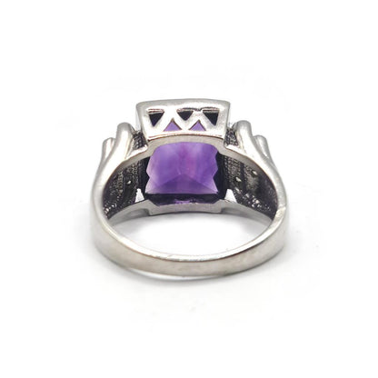 14ct white gold ring featuring a 4.25 carat purple amethyst gemstone and diamond accents, elegant jewelry accessory.