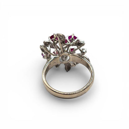 14ct white gold ring featuring a vibrant ruby centerpiece surrounded by sparkling diamonds, elegant jewelry accessory.