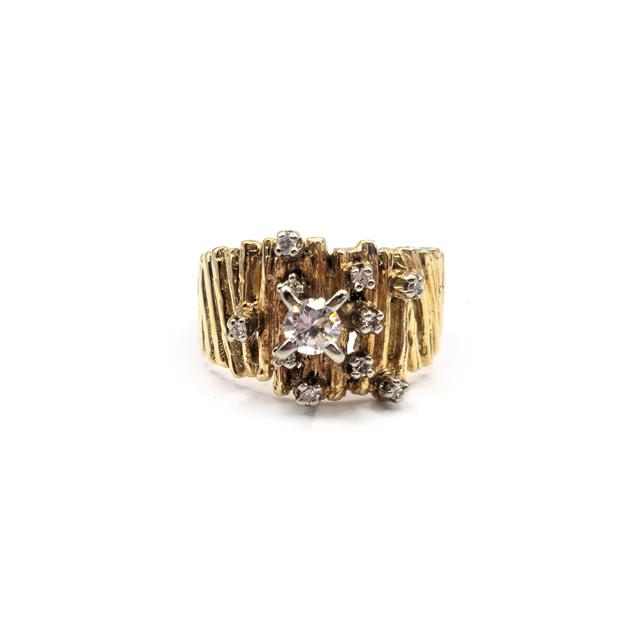 14ct yellow gold diamond ring with sparkling diamonds and a classic design, showcasing elegance and fine craftsmanship.