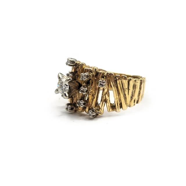 14ct yellow gold diamond ring with intricate band detailing, designed for elegant jewelry wear.