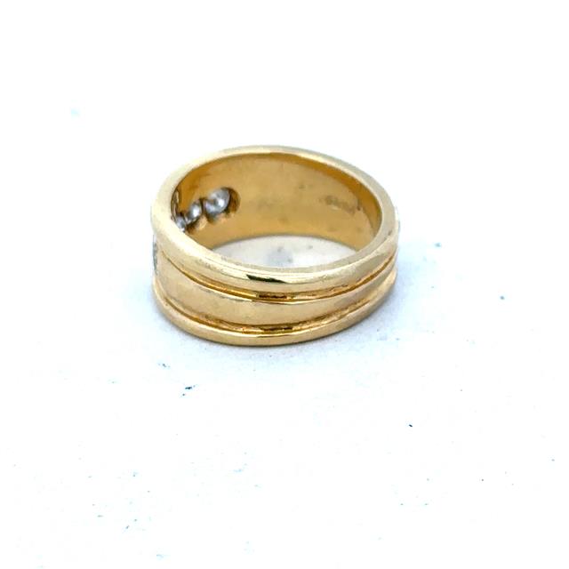 14ct yellow gold diamond ring size J1/2 with sparkling diamonds, showcasing elegant jewelry design.