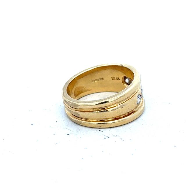 14ct yellow gold diamond ring in size J1/2, showcasing a sparkly diamond setting on a sleek gold band.