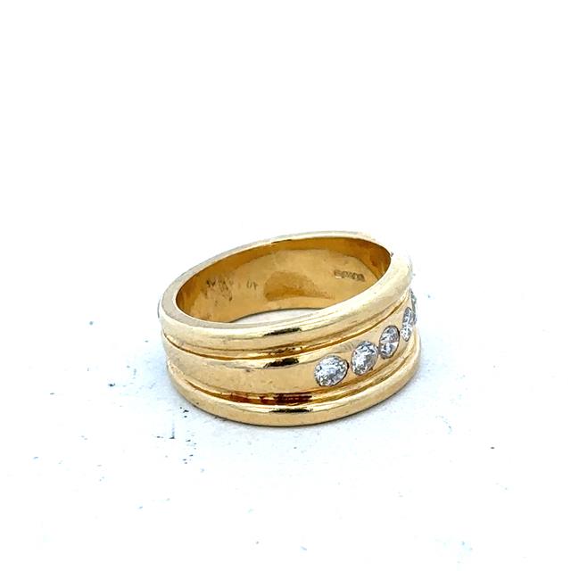 14ct yellow gold diamond ring in size J1/2, featuring a sparkling diamond set in an elegant band.