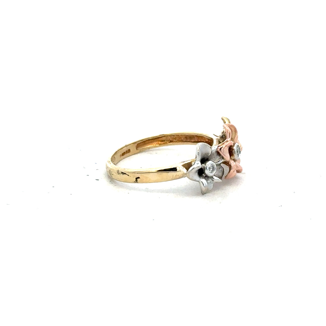 14ct yellow gold diamond ring in size L with sparkling diamonds, displayed on a neutral background.