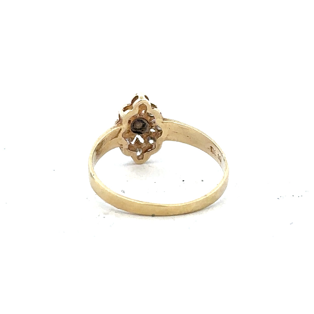 14ct yellow gold diamond ring in size L featuring a sparkling diamond setting, unbranded jewelry piece.