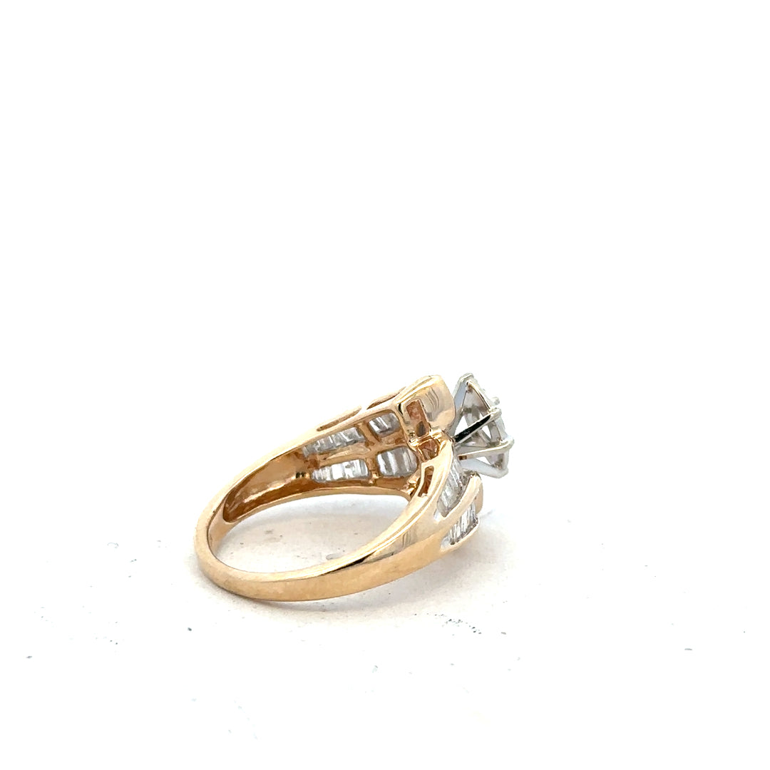 14ct yellow gold diamond ring in size L1/2, featuring a delicate band and sparkling diamonds.