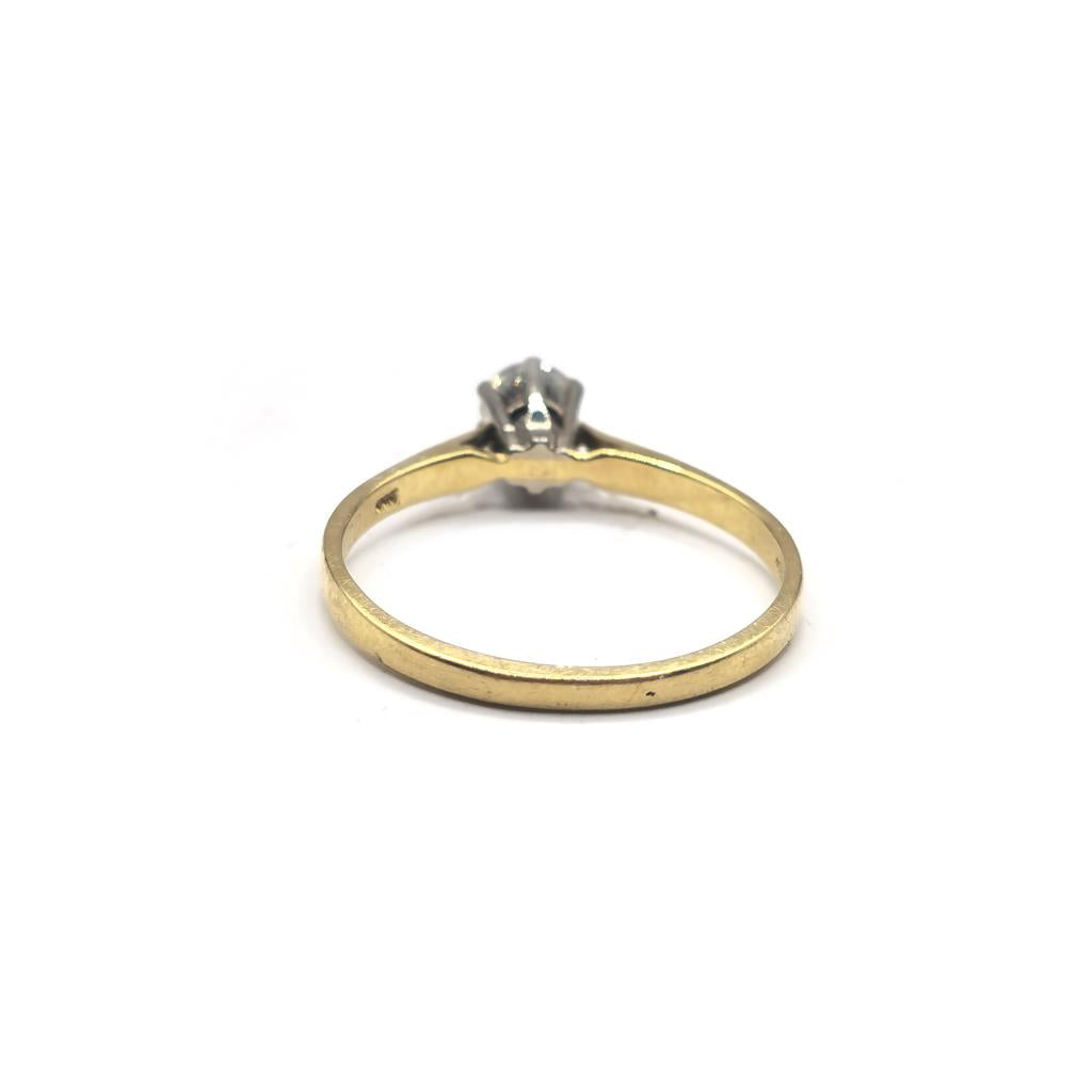 14ct yellow gold diamond ring in size P with sparkling diamonds, elegant jewelry piece.