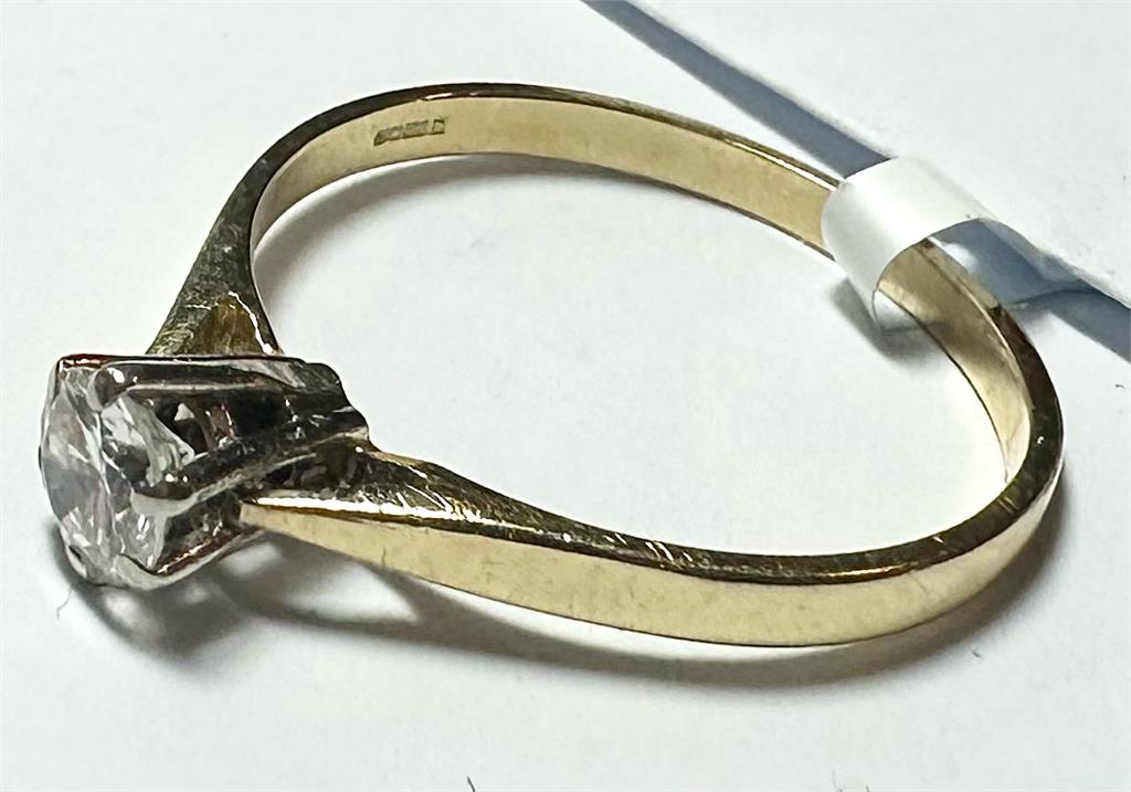 14ct yellow gold diamond ring in size P with sparkling diamonds, elegant jewelry piece featuring a classic design.