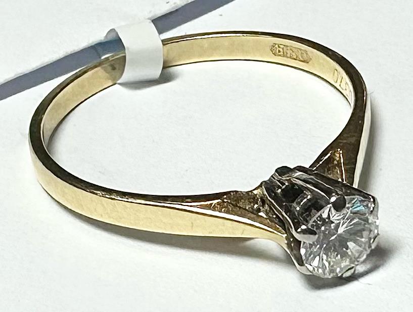 14ct yellow gold diamond ring size P with sparkling diamonds, showcasing a elegant jewelry piece.