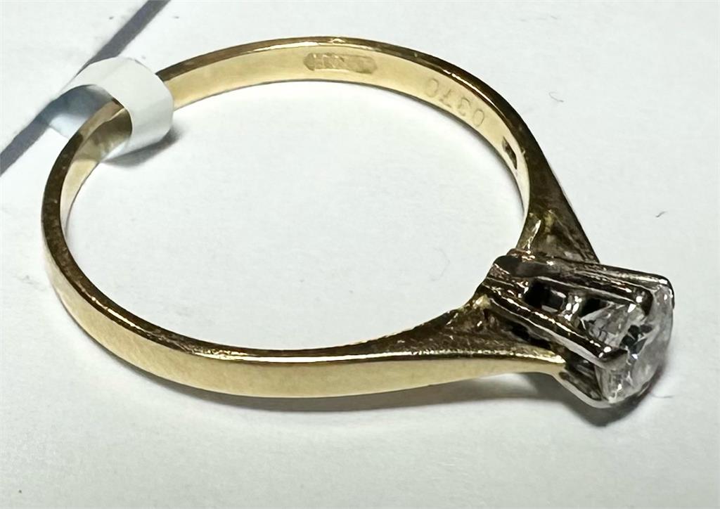 14ct yellow gold diamond ring in size P with sparkling diamonds, showcasing elegant jewelry craftsmanship.