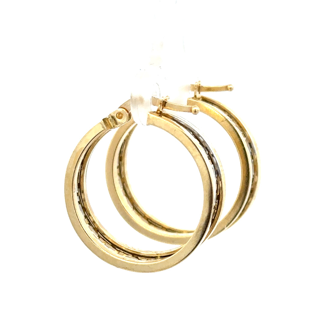 14ct yellow gold earrings with a delicate design, weighing 4.2 grams, showcasing elegant jewelry craftsmanship.