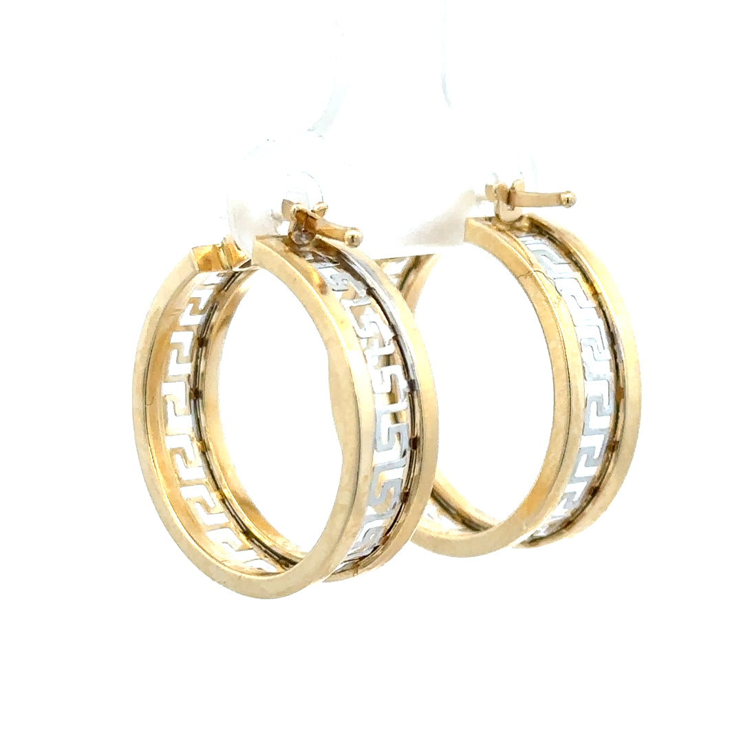 14ct yellow gold earrings weighing 4.2g, featuring classic design with a polished finish, unbranded jewelry piece.