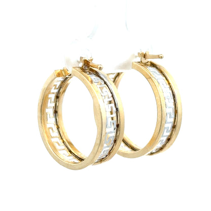 14ct yellow gold earrings weighing 4.2g, featuring classic design with a polished finish, unbranded jewelry piece.