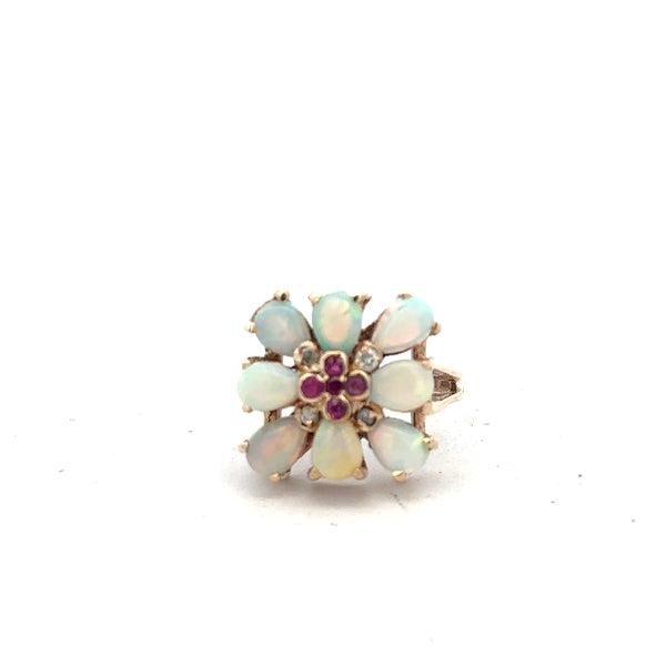 14ct yellow gold opal ring in size L1/2 featuring a vibrant opal gemstone set in a sleek gold band.
