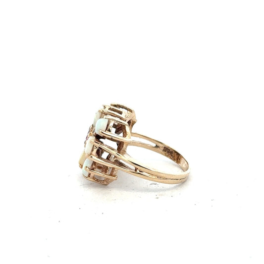 14ct yellow gold opal ring in size L1/2, featuring a vibrant opal gemstone set in a sleek gold band.