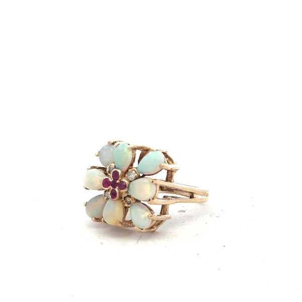 14ct yellow gold opal ring size L1/2, unbranded, featuring a vibrant oval opal gemstone set in a polished gold band.
