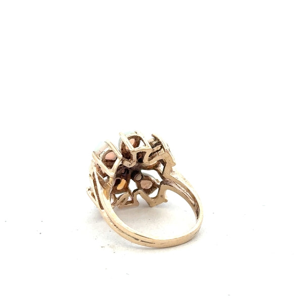 14ct yellow gold opal ring in size L1/2 featuring a vibrant opal gemstone set in a sleek gold band.