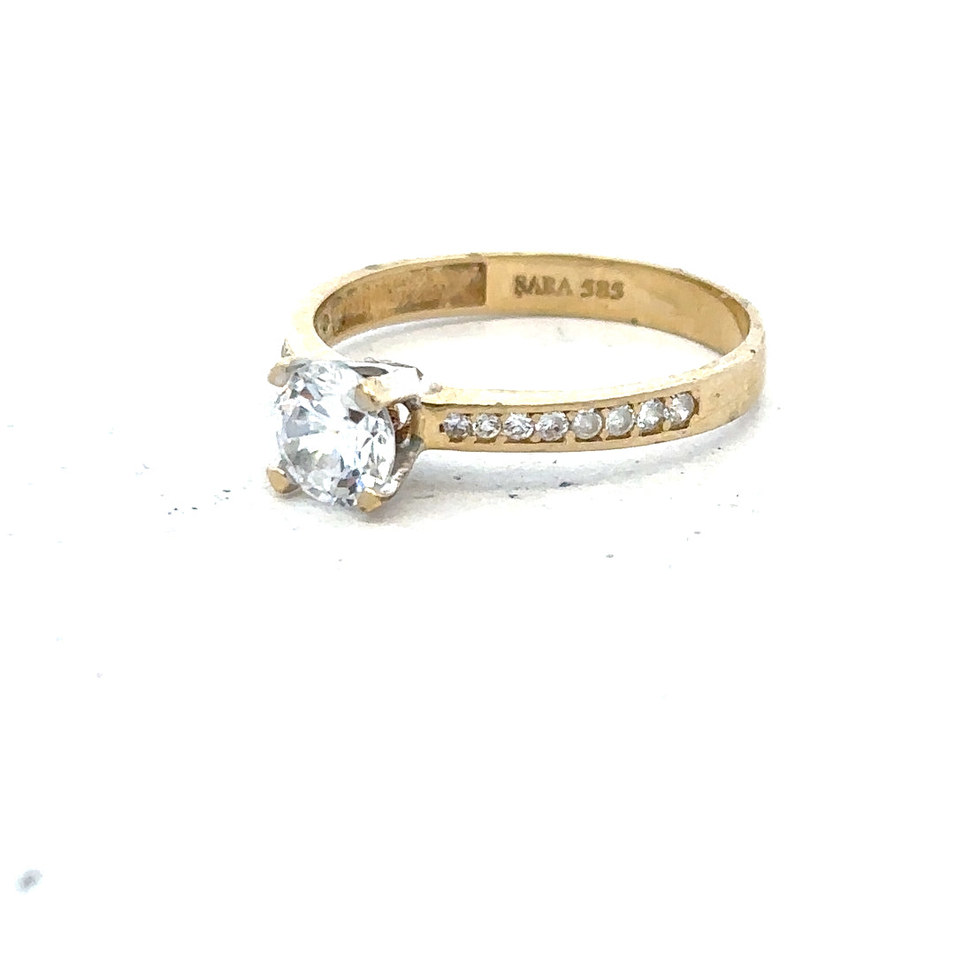 14ct yellow gold ring in size O with a smooth polished finish, unbranded jewelry displayed on a plain background.