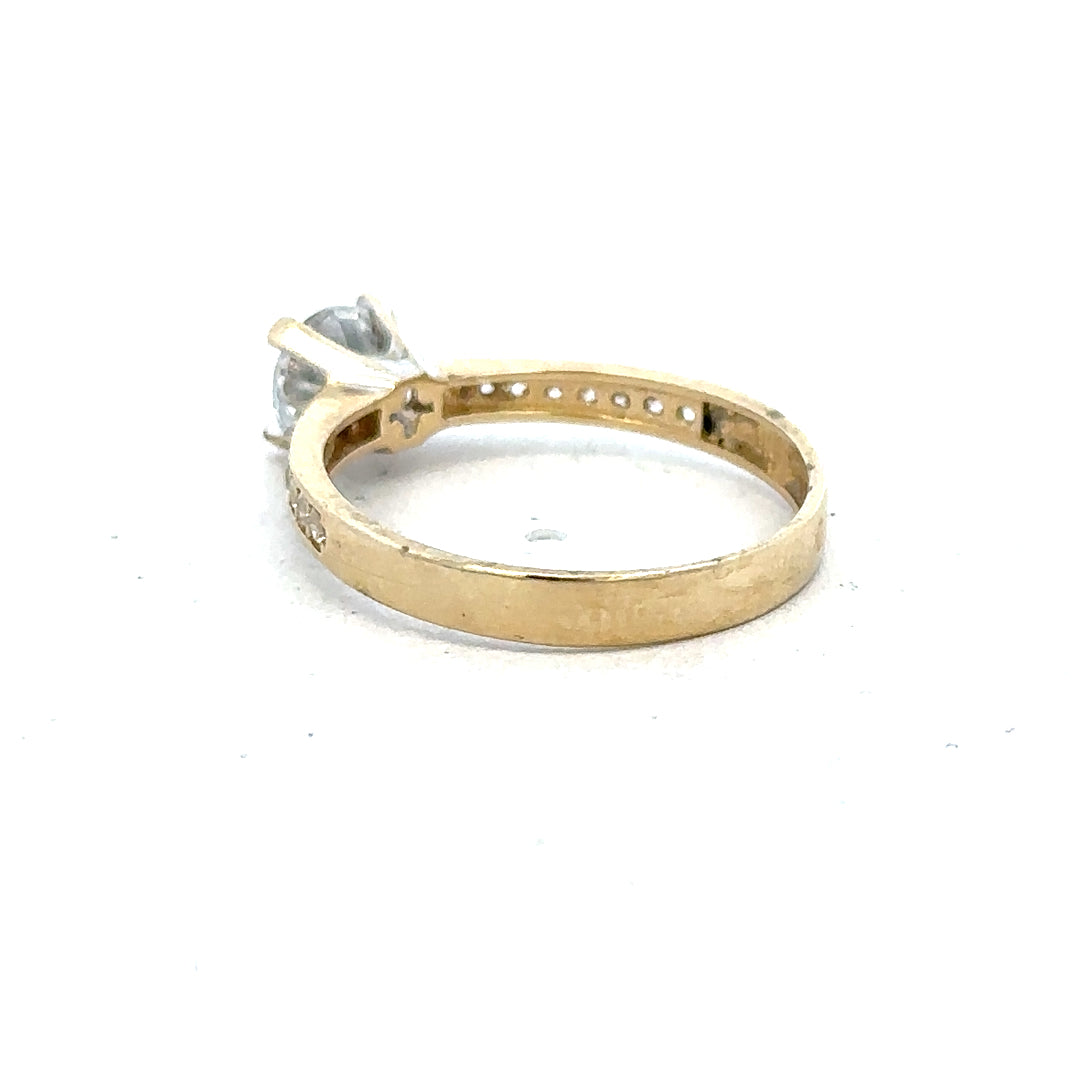 14ct yellow gold ring in size O with a smooth band, displayed on a neutral background.