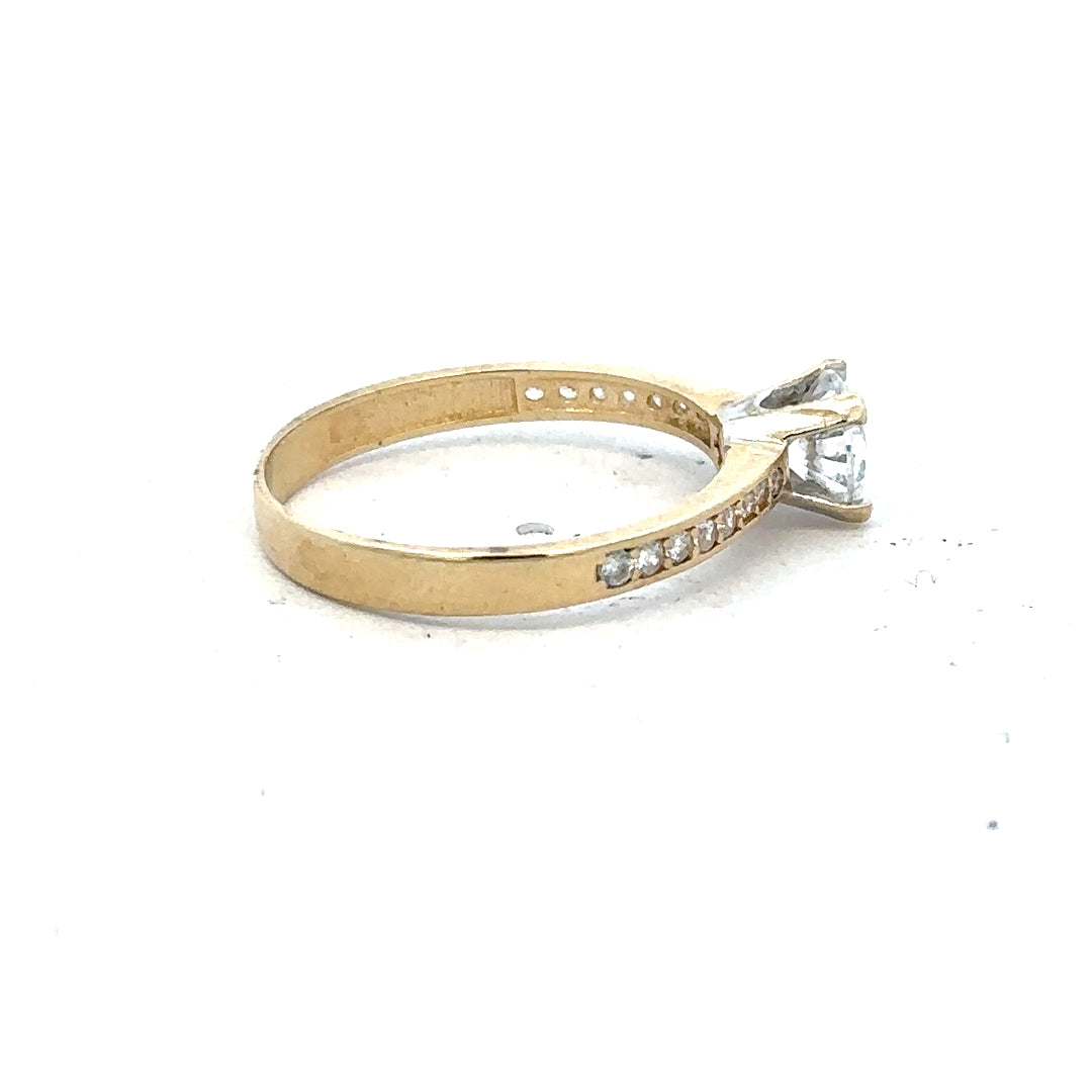 14ct yellow gold ring in size O with a smooth band, unbranded jewelry, showcasing a close-up of the polished gold surface.