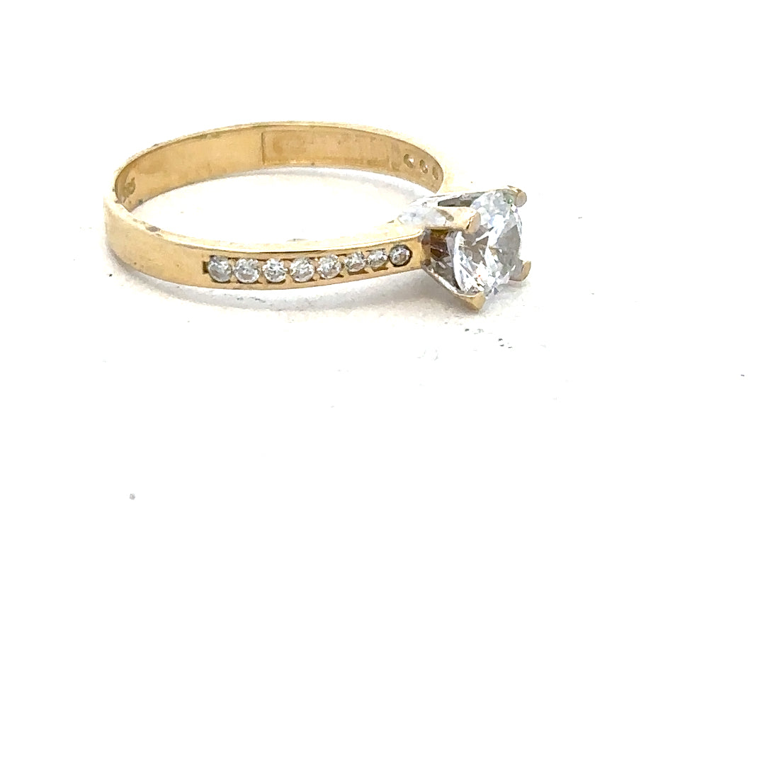 14ct yellow gold ring size O with smooth band, unbranded jewelry, shown in a close-up image highlighting the polished finish.