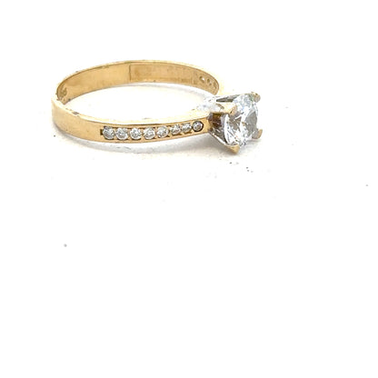 14ct yellow gold ring size O with smooth band, unbranded jewelry, shown in a close-up image highlighting the polished finish.