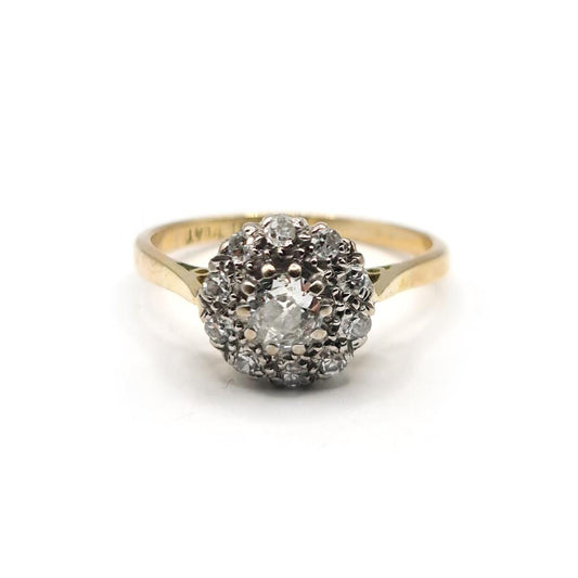18ct gold diamond cluster ring with 0.55 carats of sparkling diamonds, featuring a classic and elegant design.