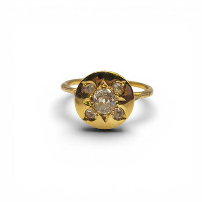 Antique 18ct yellow gold diamond ring with intricate detailing, showcasing sparkling diamonds on a vintage-style band.