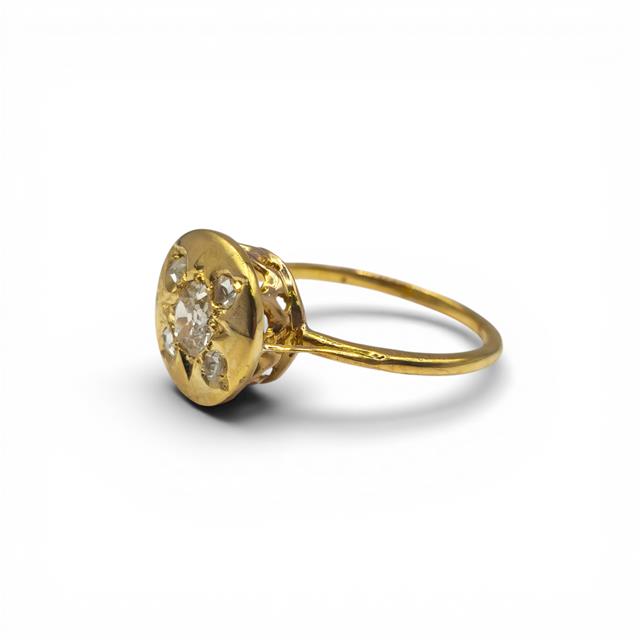 Antique 18ct yellow gold diamond ring with intricate design, showcasing a vintage style and sparkling diamond accents.