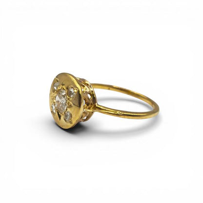 Antique 18ct yellow gold diamond ring with intricate design, showcasing a vintage style and sparkling diamond accents.