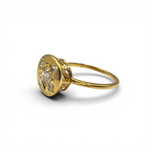 Antique 18ct yellow gold diamond ring with intricate design, showcasing a vintage style and sparkling diamond accents.