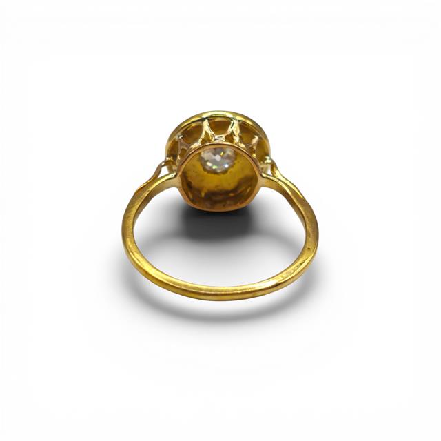 Antique 18ct yellow gold diamond ring with intricate detailing, showcasing a vintage style and sparkling diamonds.