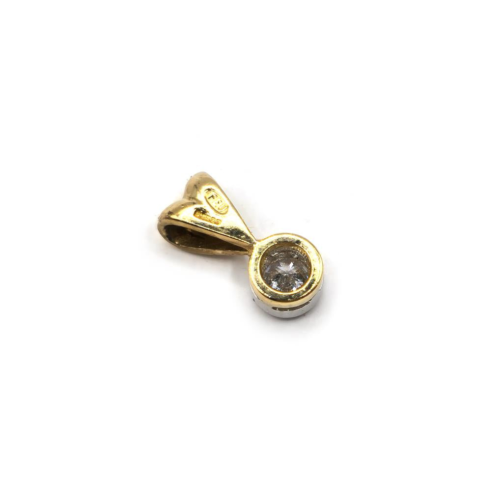 Elegant 18ct diamond pendant with sparkling diamonds on a delicate chain, unbranded jewelry piece.