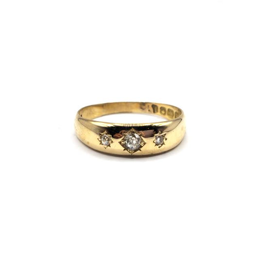 18ct diamond ring featuring sparkling diamonds set in a sleek band, unbranded jewelry design.