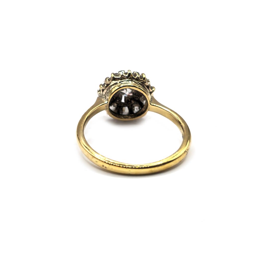Unbranded 18ct diamond ring featuring a sparkling central diamond set on a sleek band.