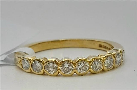 18ct diamond ring in size N, featuring a sparkling diamond setting on a sleek band, unbranded jewelry piece.