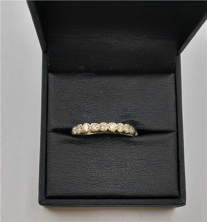 18ct diamond ring in size N with sparkling diamonds, featuring a classic design and unbranded craftsmanship.