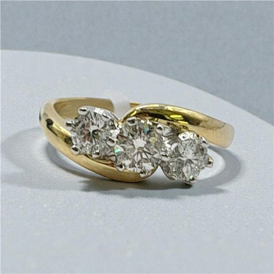 18ct gold diamond ring with 0.75 carats, size L, featuring sparkling diamonds on a sleek band.