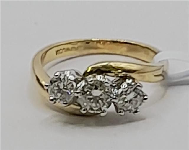 18ct gold diamond ring with 0.75ct diamonds in size L, featuring a sleek and elegant design.