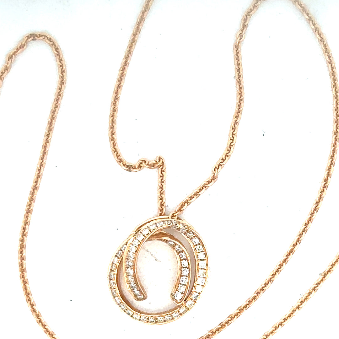18ct gold chain with diamond pendant, showcasing a delicate design and sparkling gemstones, weighing 4.0g.