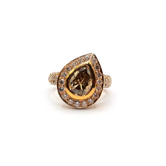 18ct rose gold brown diamond ring with a 2.65 carat pear-cut brown diamond, showcasing elegant jewelry design.