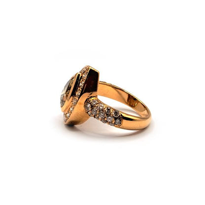 18ct rose gold brown diamond ring with a 2.65 carat pear-shaped brown diamond, showcasing elegant jewelry craftsmanship.