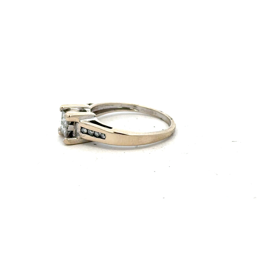 18ct white gold diamond ring with 0.33 carats of diamonds in size L, featuring a sleek and elegant design.
