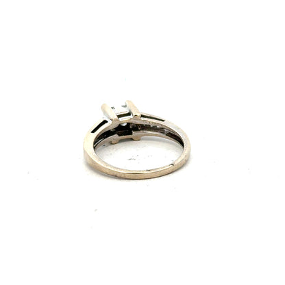 18ct white gold diamond ring with 0.33 carats, size L, featuring a sleek band and sparkling diamonds.