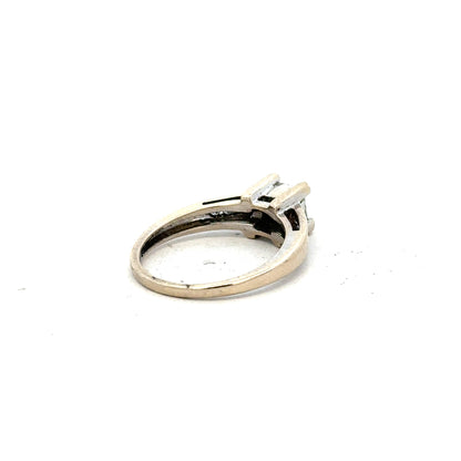 18ct white gold diamond ring with 0.33 carats, size L, featuring a delicate band and sparkling diamonds.