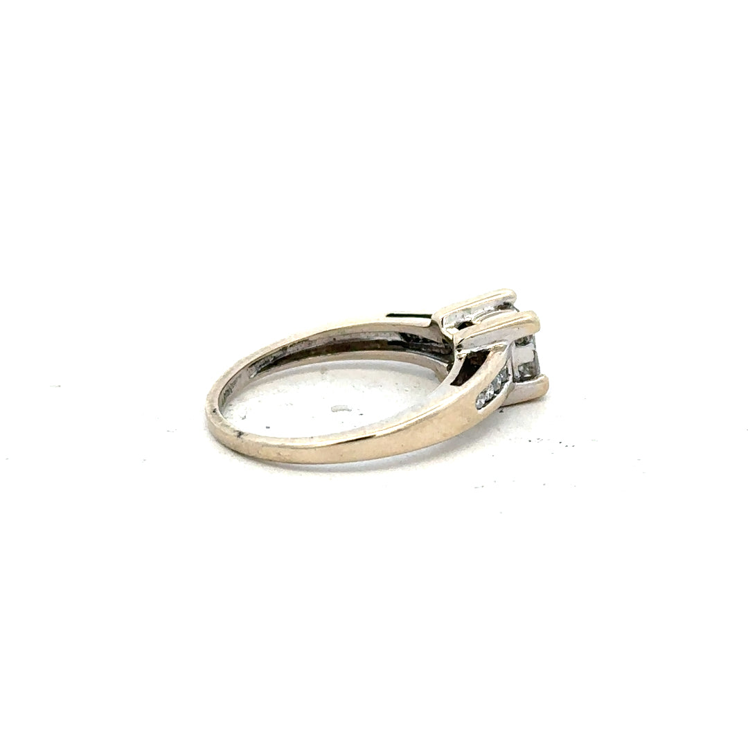 18ct white gold diamond ring with 0.33 carats, size L, featuring a sleek and elegant design.
