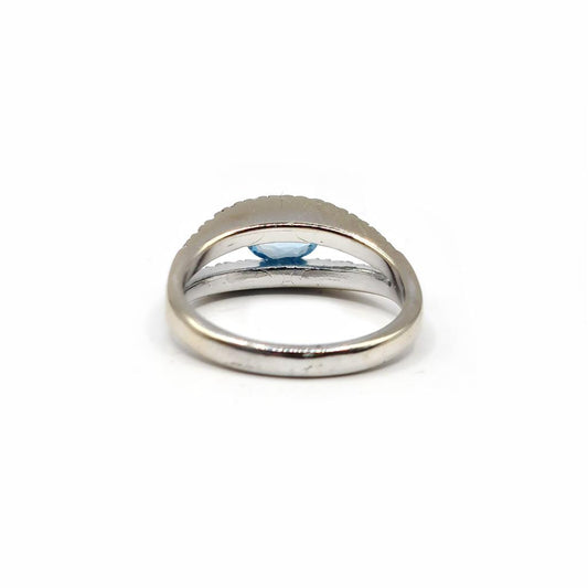 18ct white gold ring with a 0.40 carat topaz and 0.45 carat diamond accent, showcasing a elegant jewelry design.