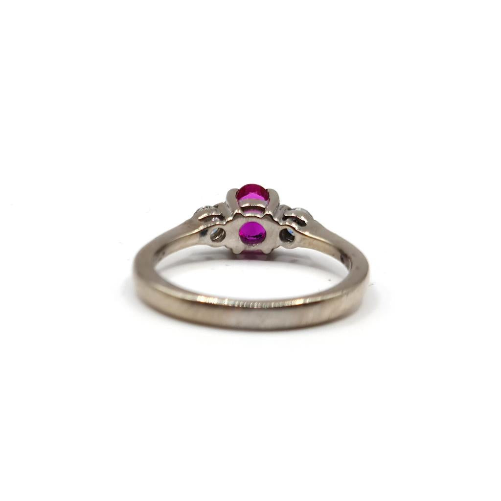 18ct white gold ruby and diamond ring featuring a 0.55 carat ruby and 0.20 carat diamonds, elegant jewelry for special occasions
