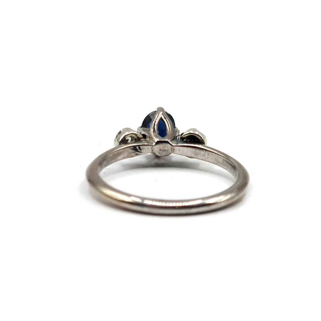 18ct white gold sapphire ring featuring a 0.70 carat central sapphire and 0.30 carat accent sapphires, elegant jewelry piece.
